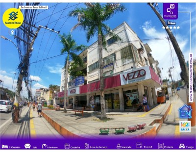 Apartamento no Centro - 2 Quartos com Varanda e Garagem.